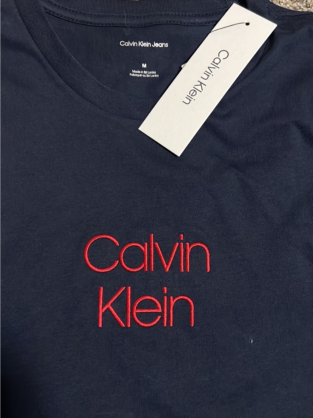 Calvin Klein Navy Short Sleeve Tee with Red Logo
